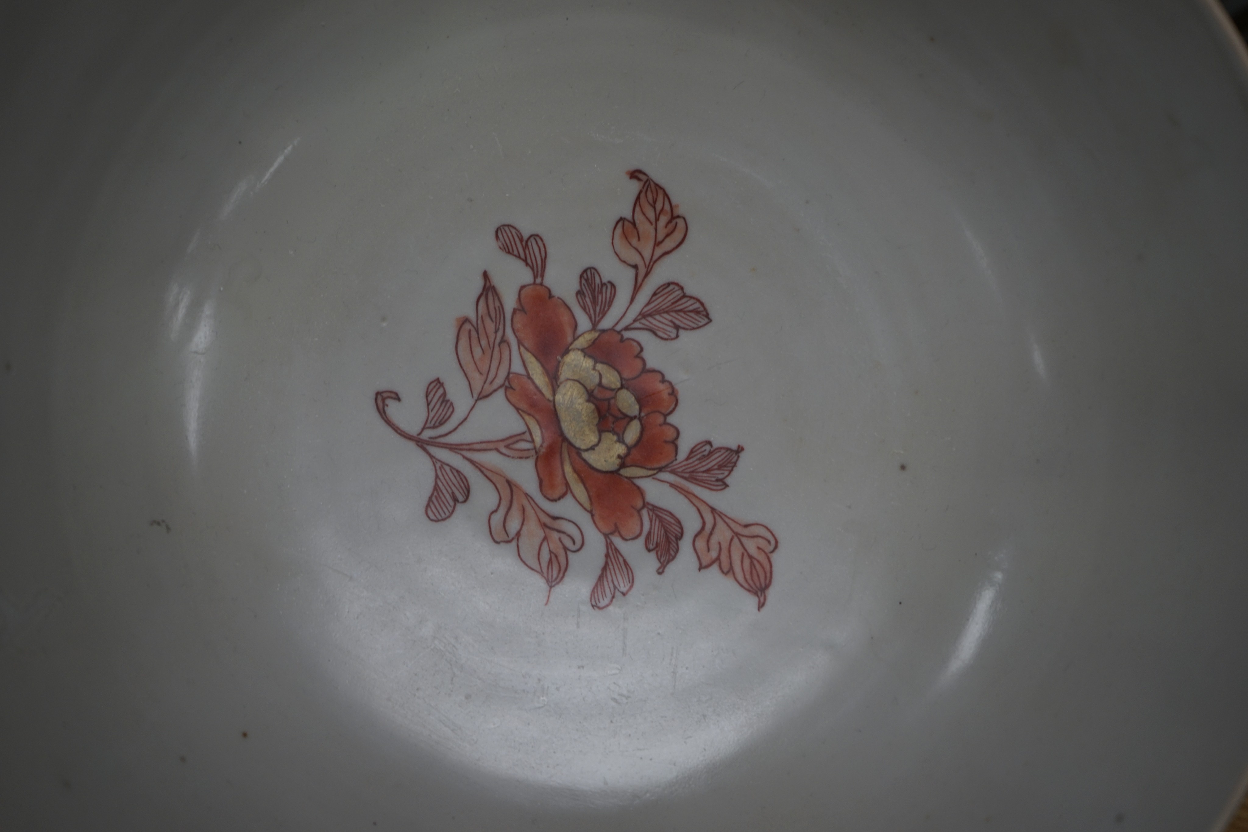 Three 18th century Chinese export porcelain bowls, largest 28 cm and two plates
